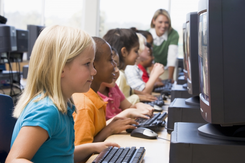 2126332-kindergarten-children-learning-how-to-use-computers